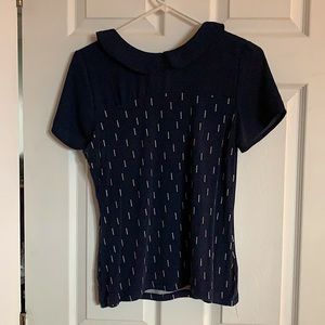 Dark blue medium shirt.